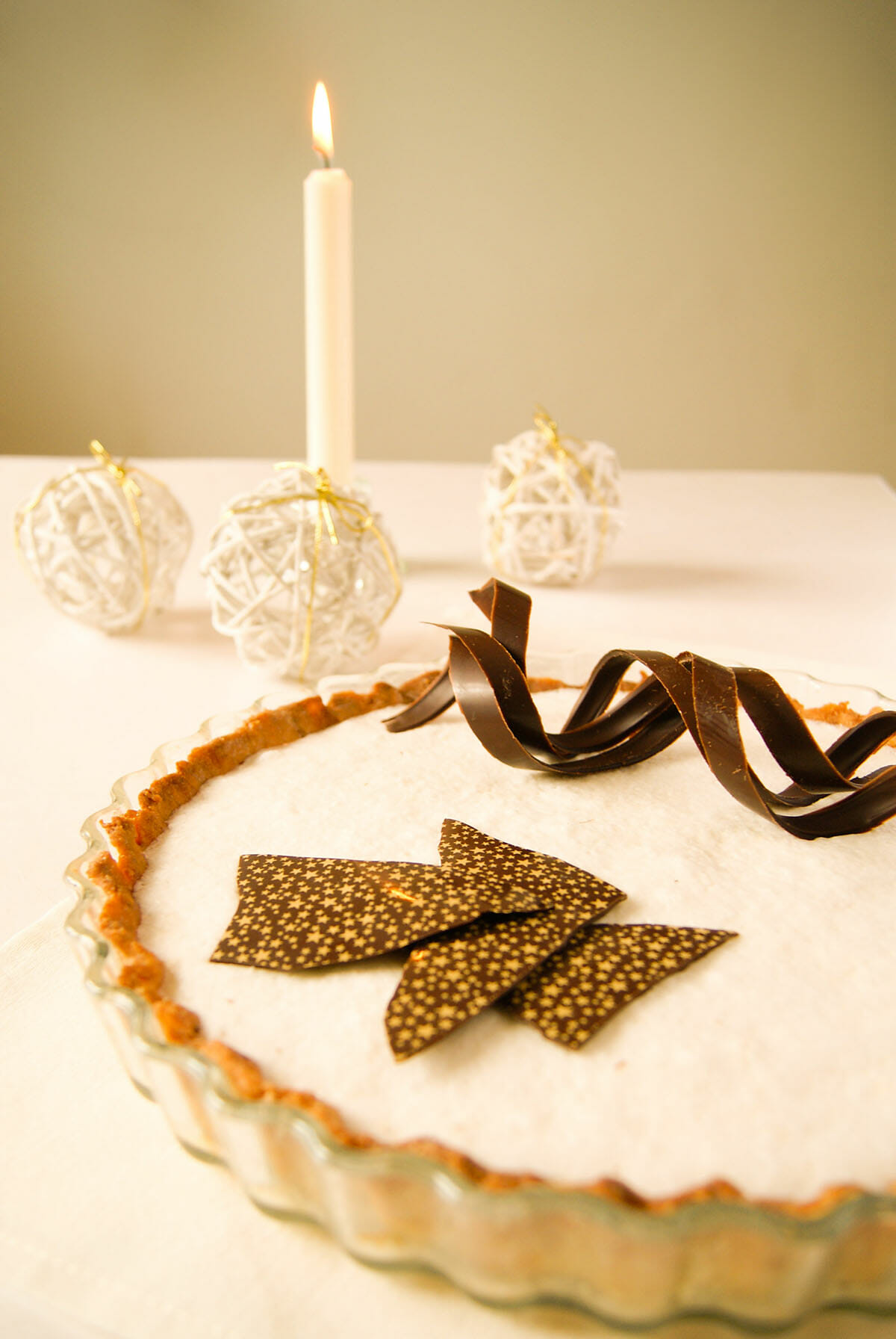 Chocolate coconut tart on praline dough